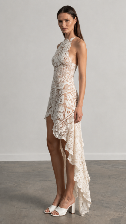 Side view of ivory lace halter-style high-low occasion dress