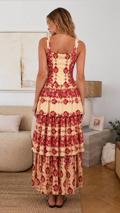 Back view of apricot and red printed maxi dress with wide straps